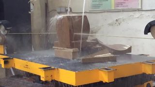 Segatrice automatica a filo diamantato CNC a 5 assi per il taglio e la modellatura di blocchi di marmo granito