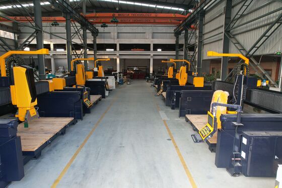 Macchina automatica a ponte a 5 assi con sistema DDX per la lavorazione di pietre 3200×2000×180mm