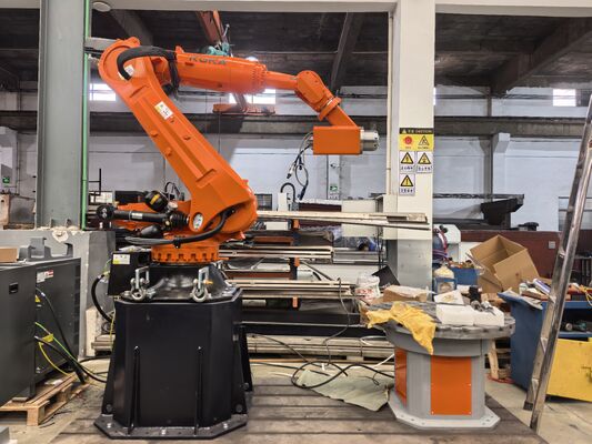 Macchina per il taglio della pietra robotizzata CNC a 6 assi con controllo interpolato e mandrino BT40 per intaglio su larga scala fino a 3100 mm